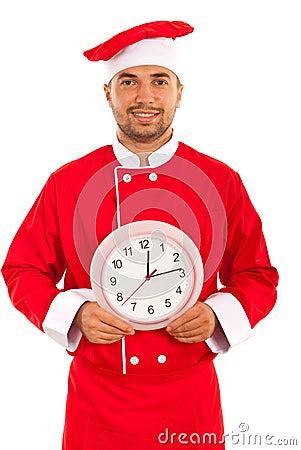 Cheerful chef with clock Stock Photo