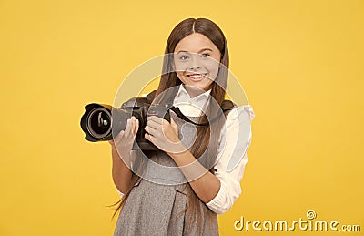 cheerful child girl take photo with digicam, photography Stock Photo