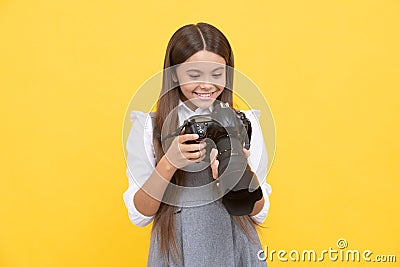 cheerful child girl take photo with digicam, photography Stock Photo