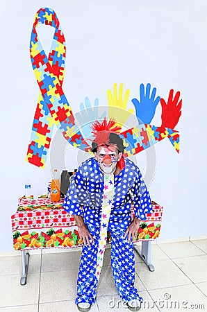 The cheerful colorful clown Mineirinho at the inauguration of the TEA Mother Clinic Editorial Stock Photo