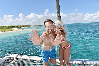 Cheerful couple on the deck of sailing boat in caribbean sea Stock Photo