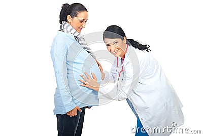 Cheerful doctor examine pregnant belly Stock Photo