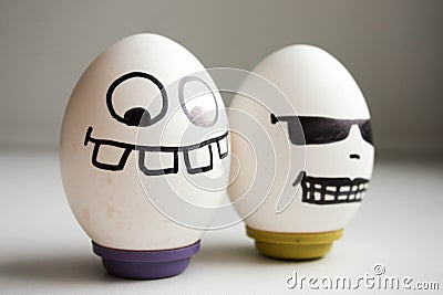Cheerful eggs. cool with glasses Stock Photo