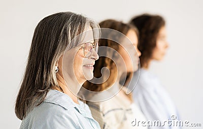 Cheerful european senior, mature and teen women and girl profile Stock Photo