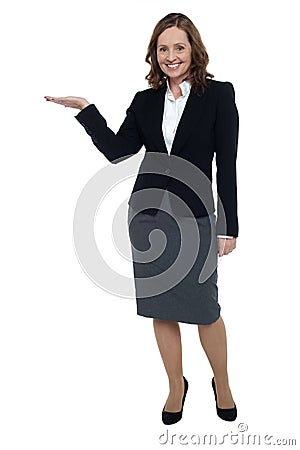 Cheerful executive presenting copy space Stock Photo