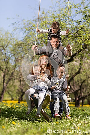 cheerful family having a picnic. Stock Photo