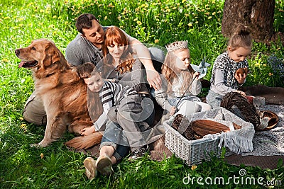 cheerful family having a picnic. Stock Photo
