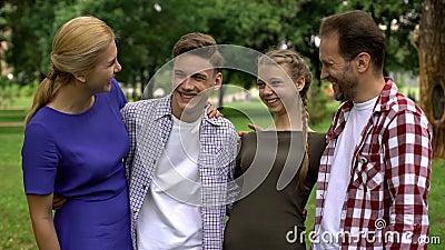 Cheerful family laughing, having fun together, spending leisure time, wellness Stock Photo