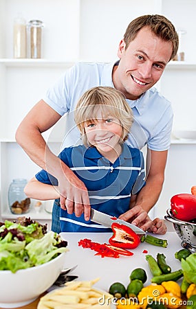 Cheerful father and his son cooking Stock Photo