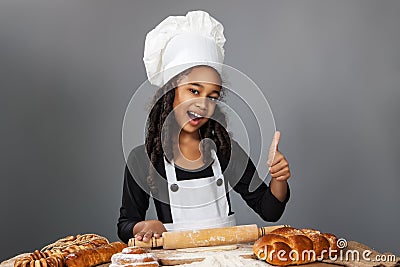 Cheerful girl chef Stock Photo