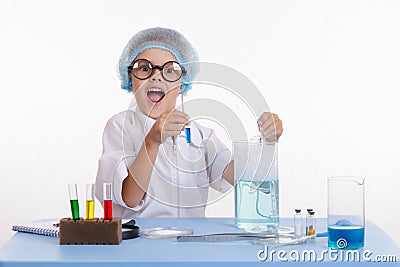 Cheerful girl chemist Stock Photo