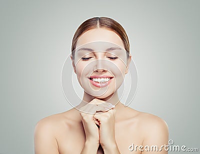 Cheerful girl with closed eyes portrait. Beautiful woman with healthy skin. Spa beauty, skincare and cosmetology concept Stock Photo