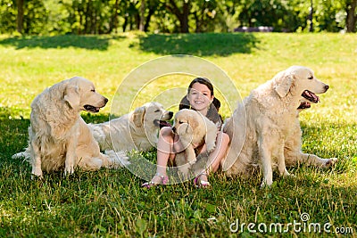 Cheerful girl and dogs Stock Photo