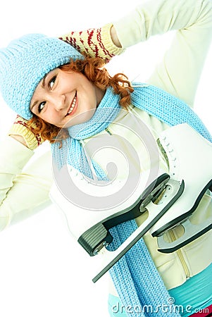 Cheerful girl goes ice-skating Stock Photo