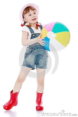 Cheerful girl in short summer shorts and boots Stock Photo
