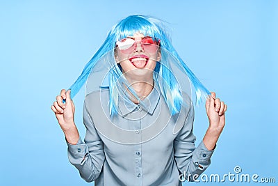 cheerful glamorous woman in pink glasses purple wig fashion Stock Photo