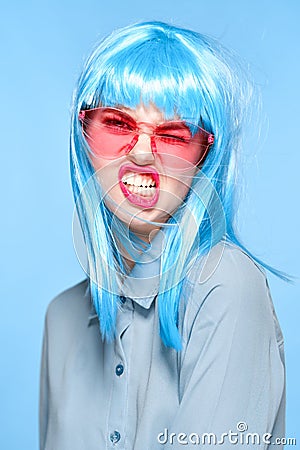 cheerful glamorous woman in pink glasses purple wig fashion Stock Photo