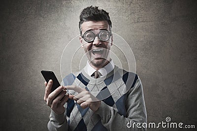 Cheerful guy with smartphone Stock Photo