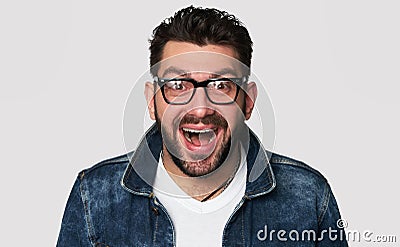 Cheerful hipster guy smiles happily Stock Photo
