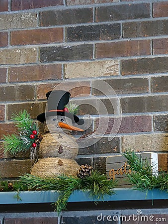 Cheerful holiday snowman decoration interior design for the holidays. Stock Photo