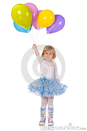 Cheerful little girl with balloons Stock Photo