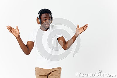 cheerful man african appearance in headphones music emotions entertainment Stock Photo