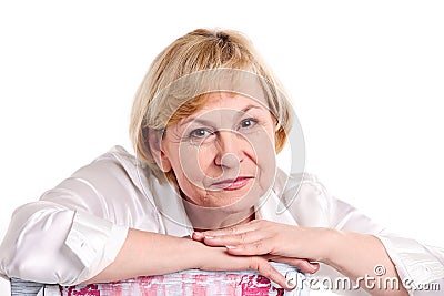 Cheerful mature woman over white background Stock Photo