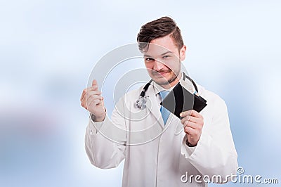 Cheerful medic receiving his payment or salary Stock Photo
