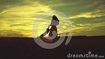 cheerful mother circling little child park sunset. happy family life. travel mom daughter girl sunlight sky. kid Stock Photo