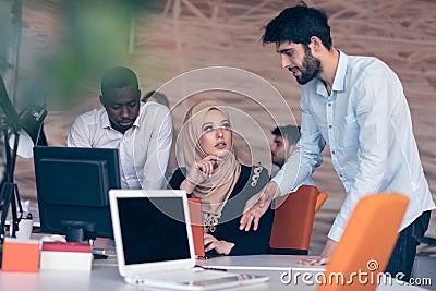 Cheerful multicultural business partners teamwork Stock Photo