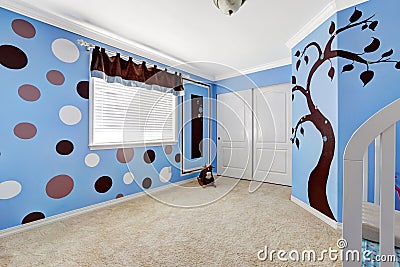 Cheerful murals in baby room. Stock Photo