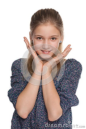 Cheerful preteen girl against the white Stock Photo