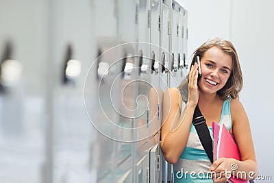 Cheerful pretty student phoning Stock Photo