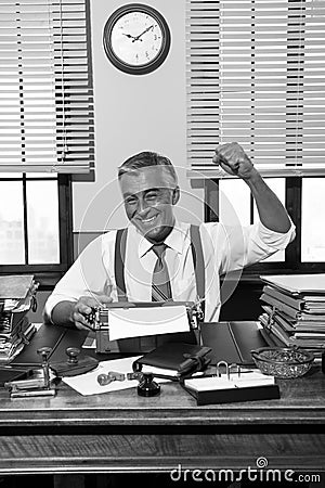 Cheerful reporter with fist raised Stock Photo