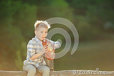Cheerful Sitting Fence Smiling Camera Farm boy Stock Photo
