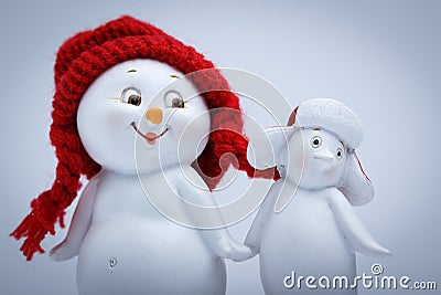 Cheerful snowman and penguin Stock Photo