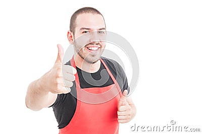 Cheerful supermarket employee showing double like sign Stock Photo