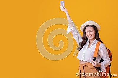 Cheerful Traveler tourist asian woman with travel bags and summer hat ready to traveling and holding credit card Stock Photo