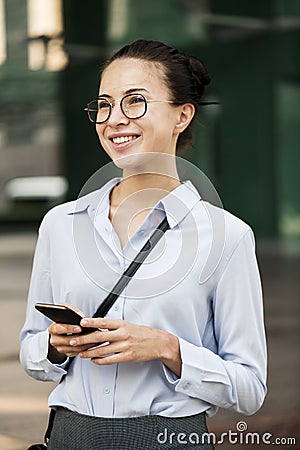 A cheerful white woman in casual dress Stock Photo