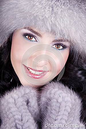 Cheerful woman clothing in warm hat. Stock Photo