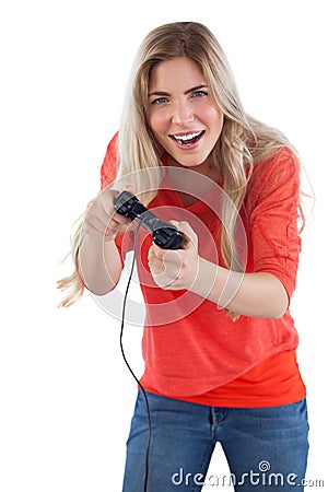 Cheerful woman holding video games joystick Stock Photo