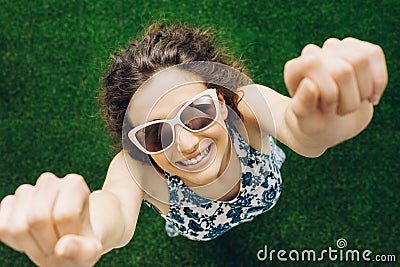 Cheerful woman in the park Stock Photo