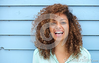 Cheerful young african woman smiling Stock Photo