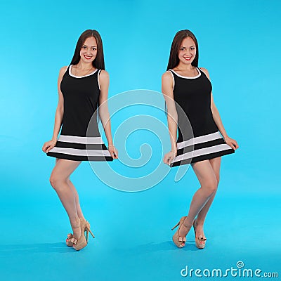 Cheerful young girl. Mirror reflection. Stock Photo