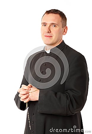 Cheerful young priest Stock Photo
