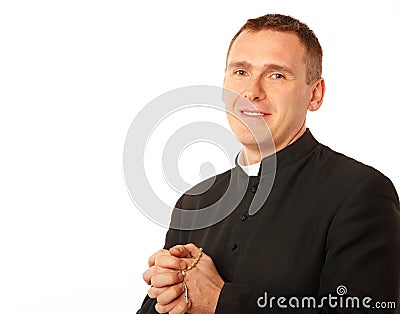 Cheerful young priest Stock Photo