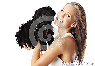 Cheerful Young Woman Playing Black Puppy Isolated Stock Photo