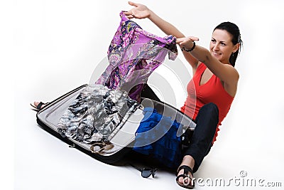 Lovely woman with her travel suitcase Stock Photo