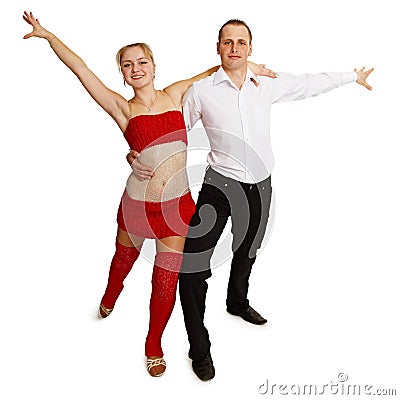 Cheerfully dancing young people on white Stock Photo