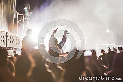 Cheering Crowd at music festival, teens having fun Editorial Stock Photo